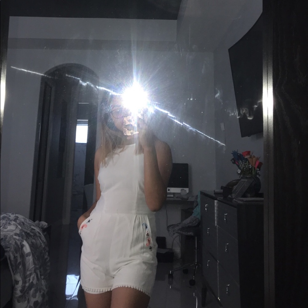 Beautiful white romper with small designs